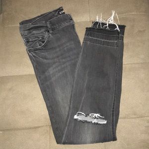 Black/grey skinny jeans. High rise.